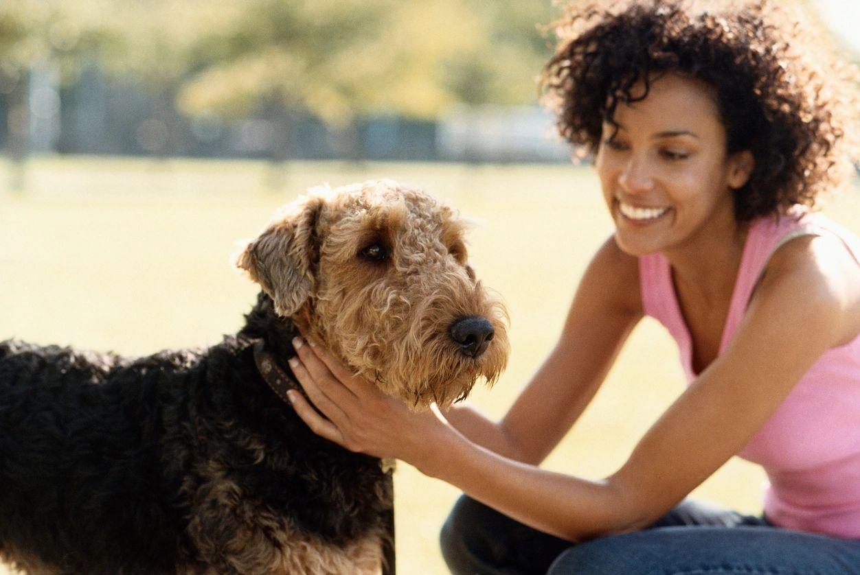 Happy lady/girl with a dog